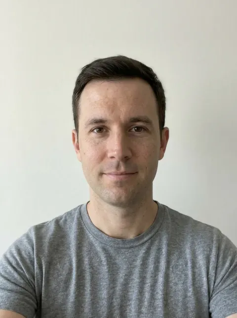 Plain front-facing selfie, demonstration model